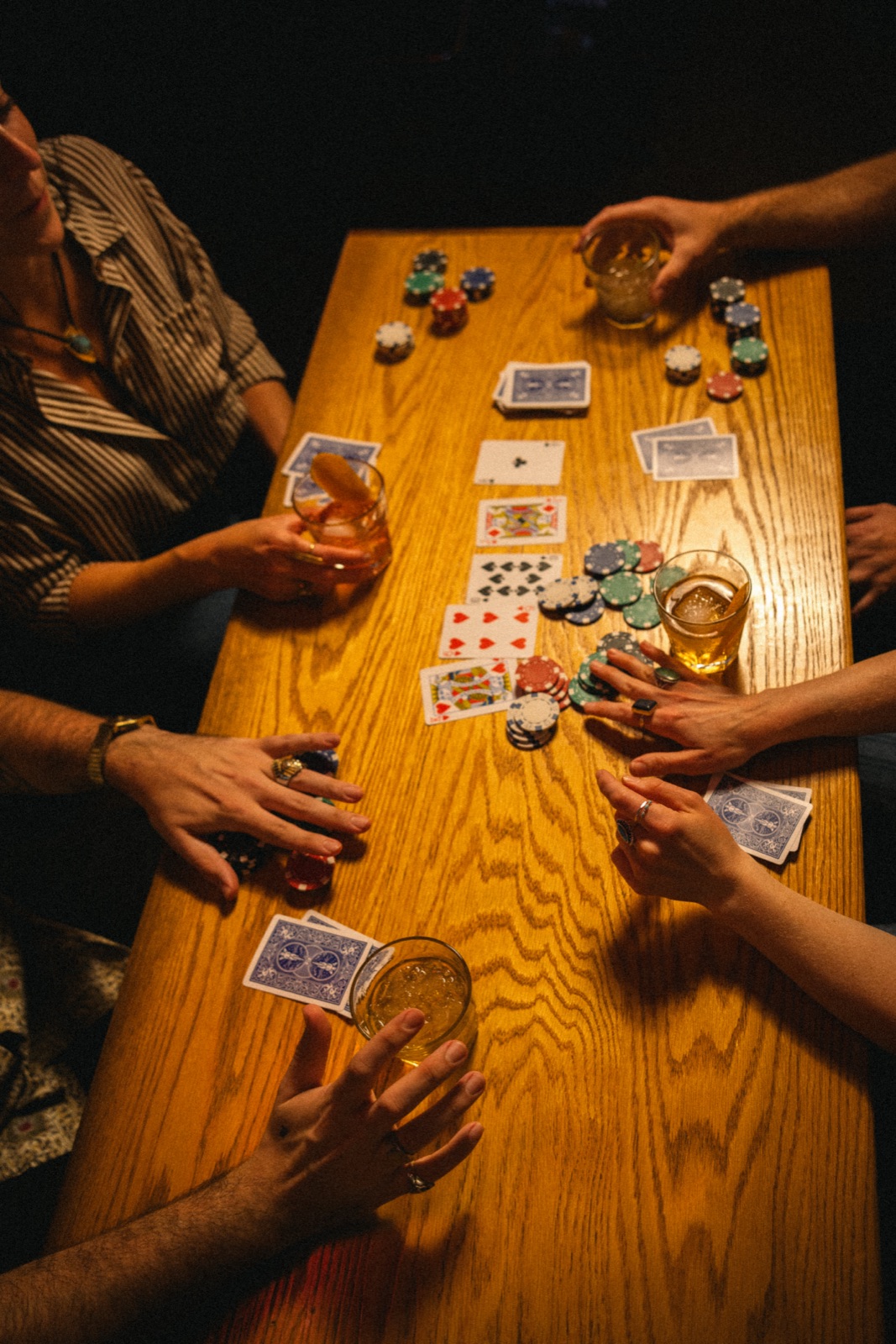 Poker night — overhead card game scene